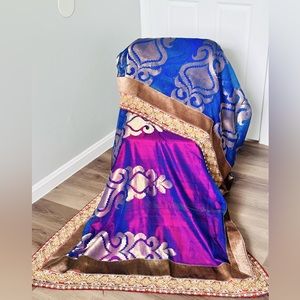 Brand new blue print Saree with red heavy border with intricate stonework